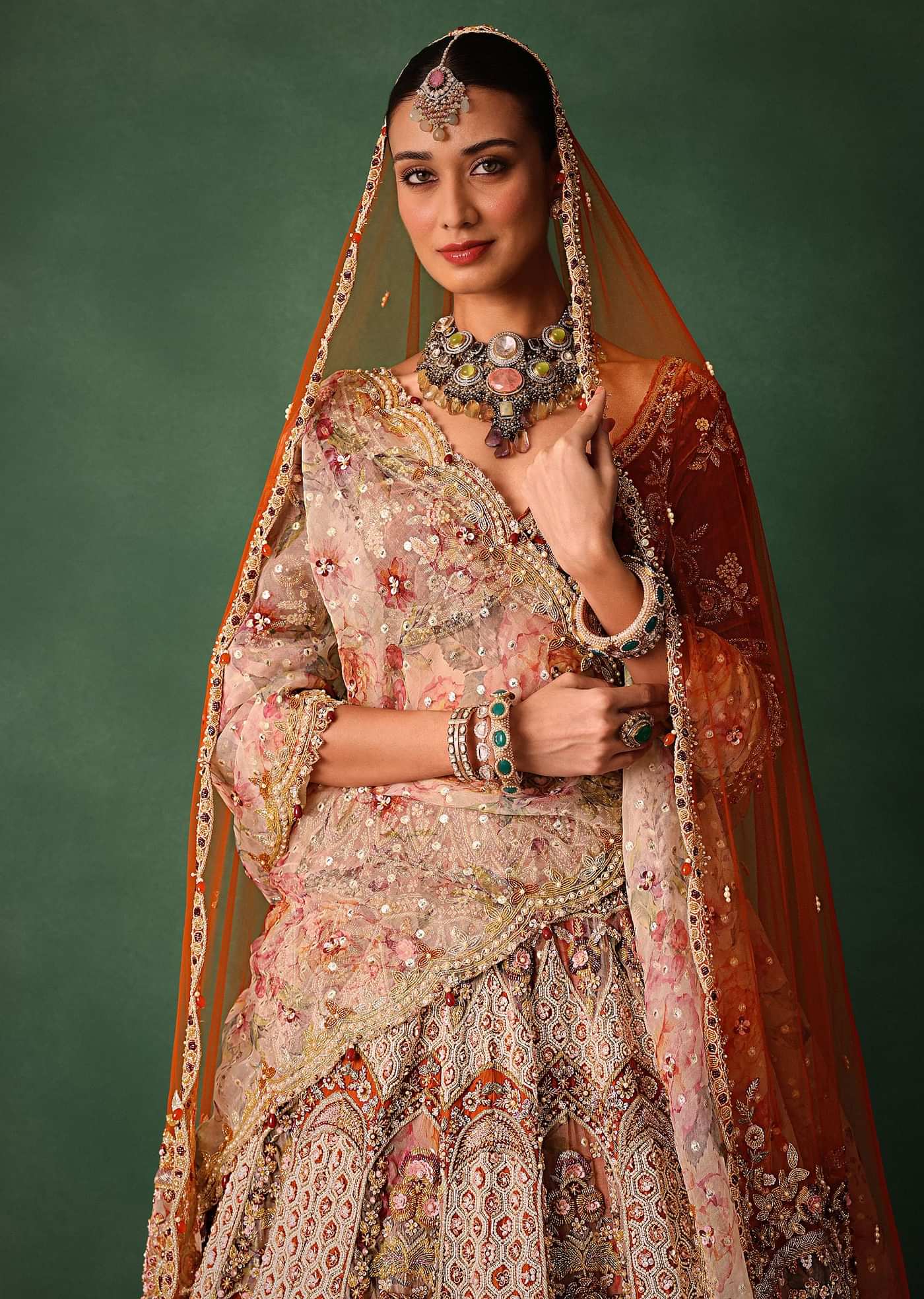 Rust V Neck Blouse With Heavy Jaal Cutdana Work Bridal Lehenga And Heavy Dupatta