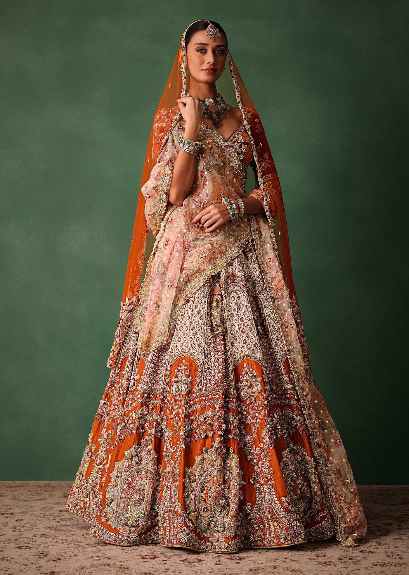 Rust V Neck Blouse With Heavy Jaal Cutdana Work Bridal Lehenga And Heavy Dupatta