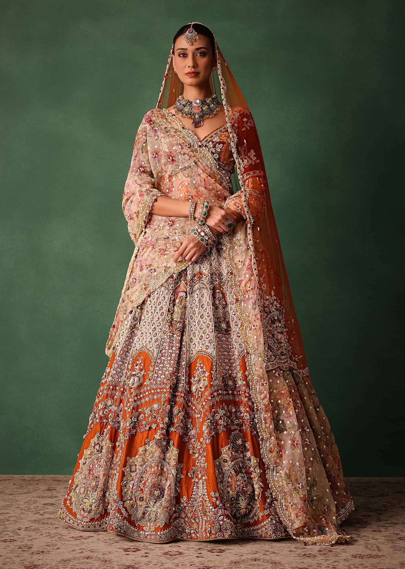 Rust V Neck Blouse With Heavy Jaal Cutdana Work Bridal Lehenga And Heavy Dupatta
