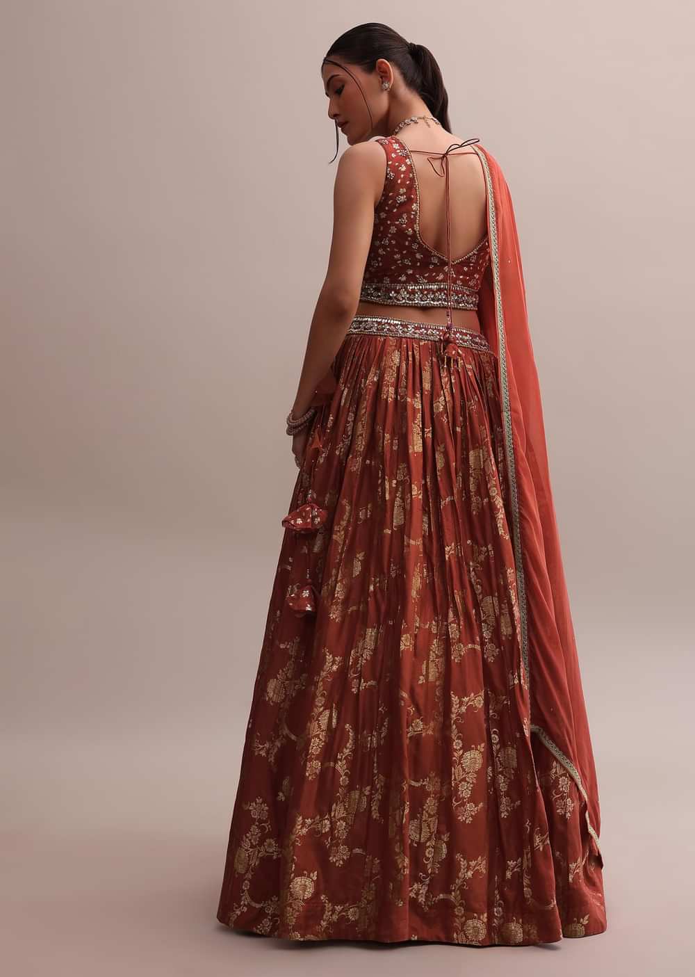 Rusty Orange Banarasi Silk Printed Lehenga With Slit Cut Choli And Dupatta