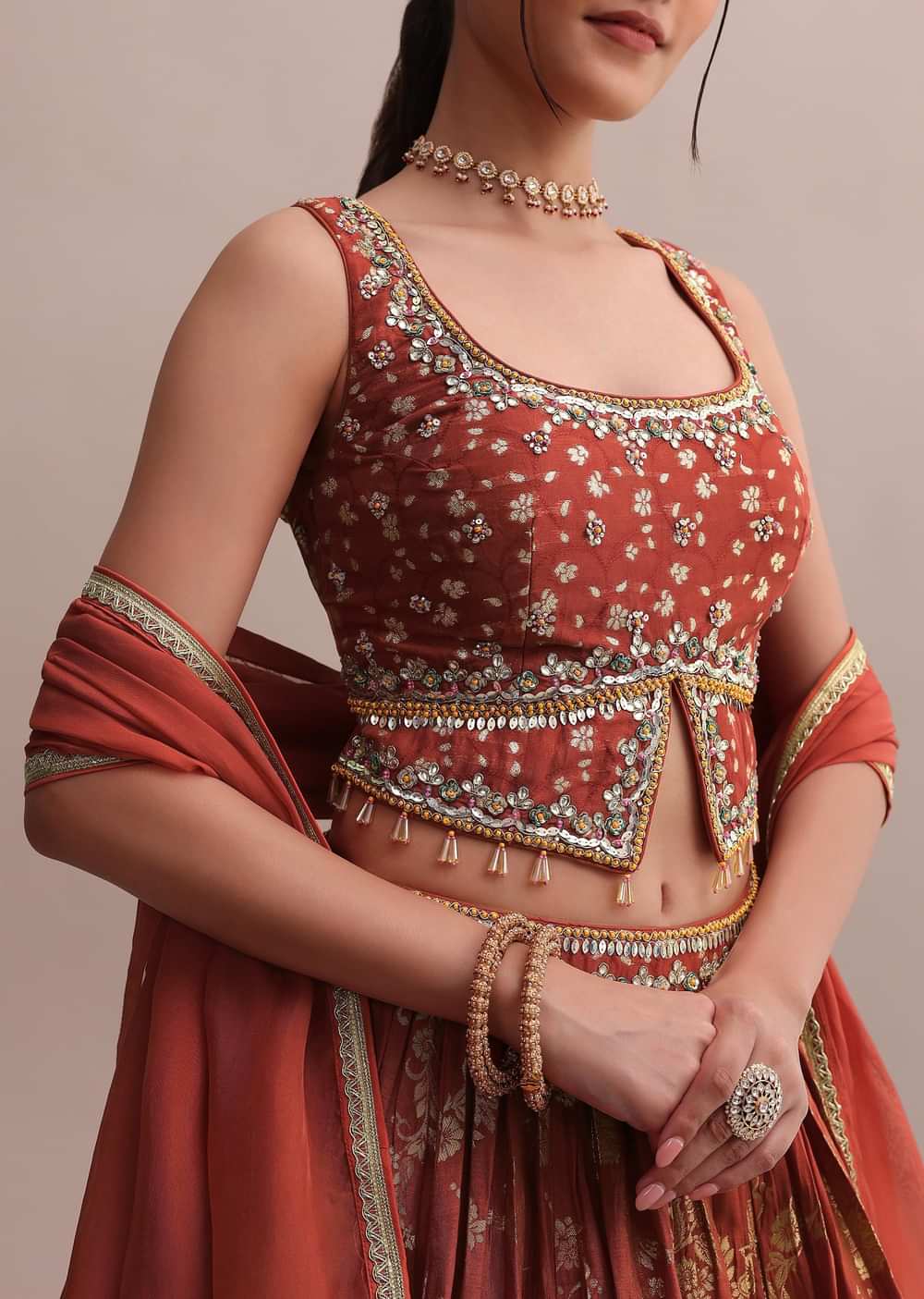 Rusty Orange Banarasi Silk Printed Lehenga With Slit Cut Choli And Dupatta