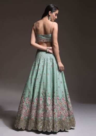 Sage Green Lehenga Choli In Raw Silk With Vibrant Resham Embroidered Cluster Of Summer Blooms And Buttis