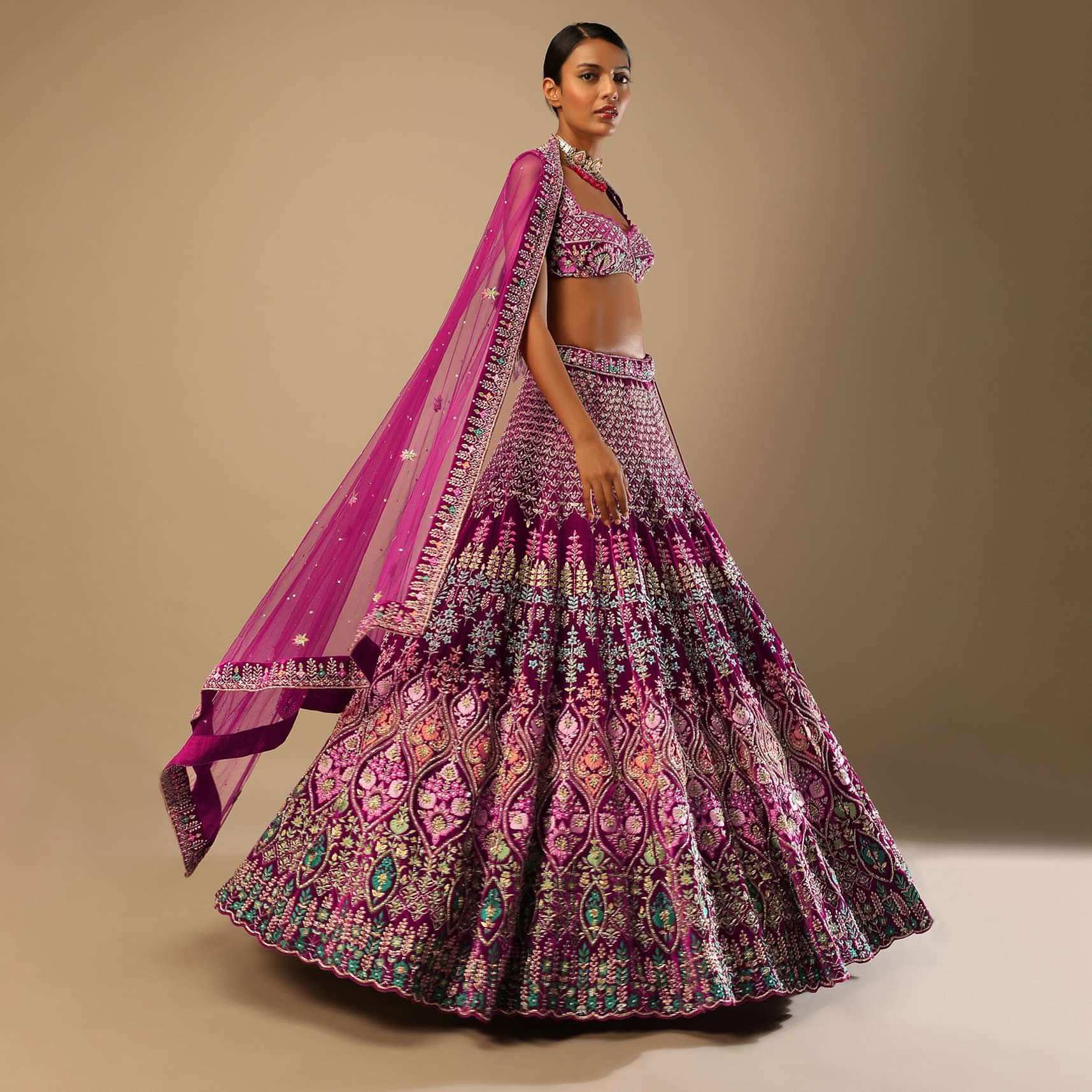 Sangria Lehenga Choli In Velvet With Colorful Resham And Sequin Flowers And Golden Cut Dana Adorned Moroccan Motifs