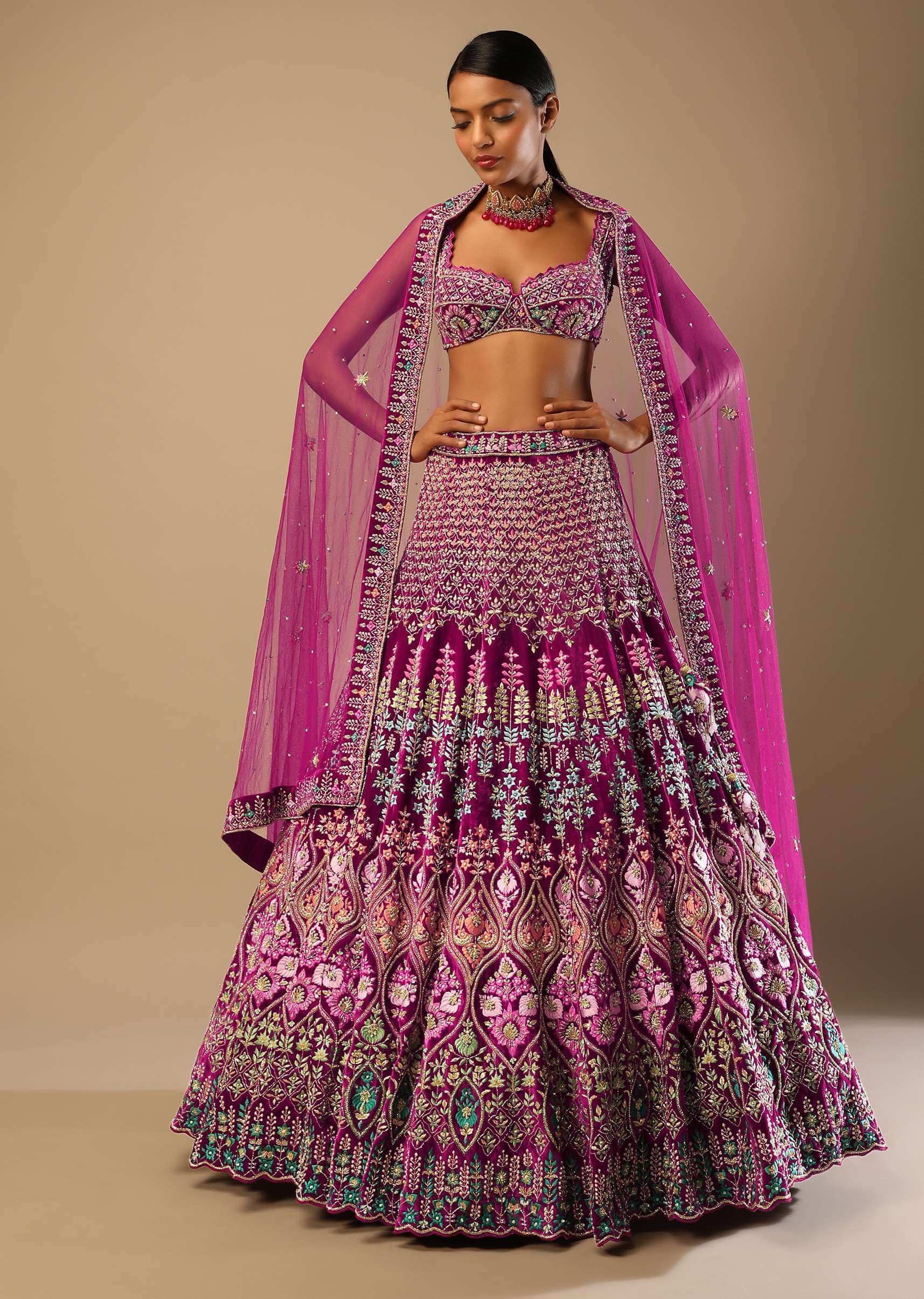 Sangria Lehenga Choli In Velvet With Colorful Resham And Sequin Flowers And Golden Cut Dana Adorned Moroccan Motifs