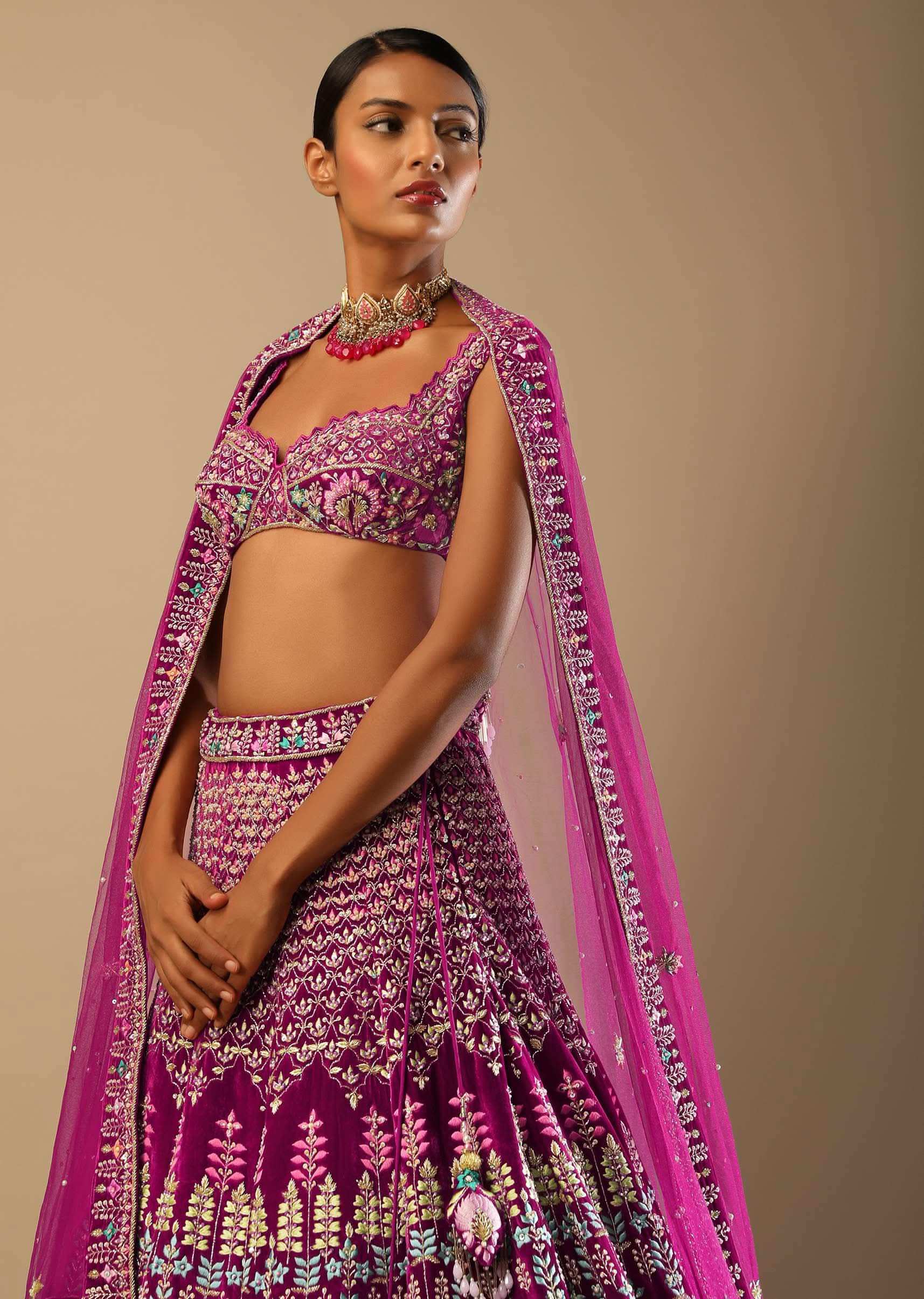 Sangria Lehenga Choli In Velvet With Colorful Resham And Sequin Flowers And Golden Cut Dana Adorned Moroccan Motifs