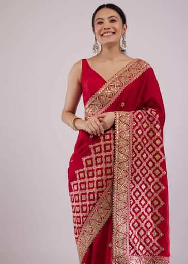 Maroon Red Dola Silk Saree With Intricate Embroidery