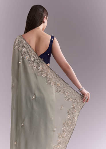 Sea Green Tissue Embroidered Saree With Floral Buttis