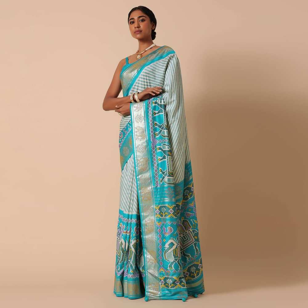 Sea Blue Patola Saree In Silk With Foil Worked Border And Unstitched Blouse Piece