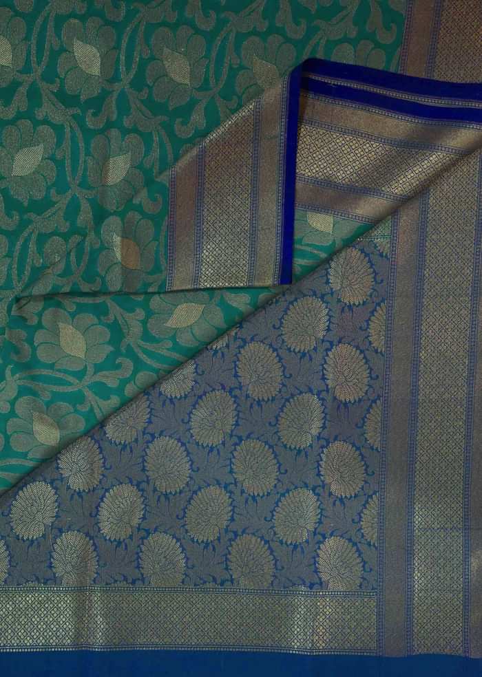 Sea blue saree featuring in floral weave only on Kalki