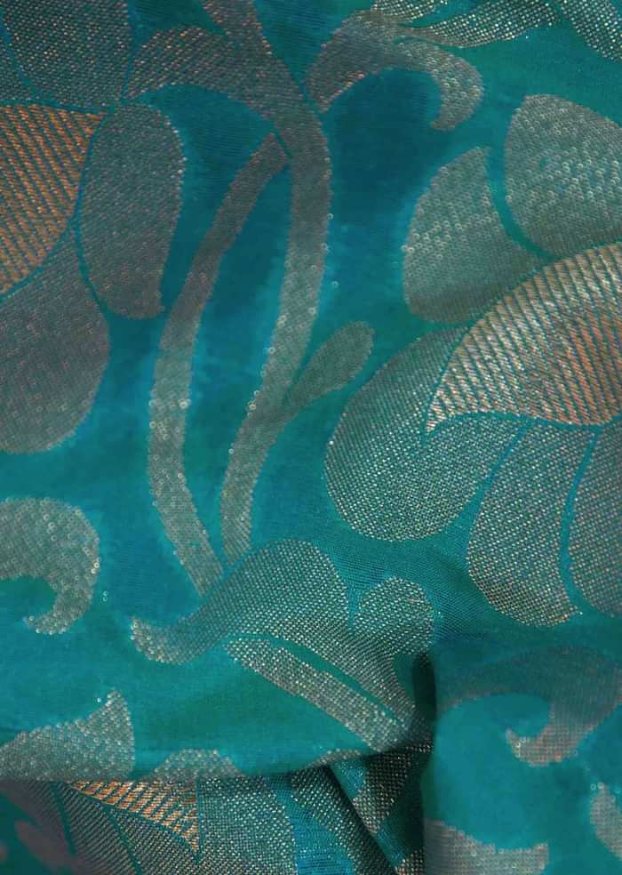 Sea blue saree featuring in floral weave only on Kalki