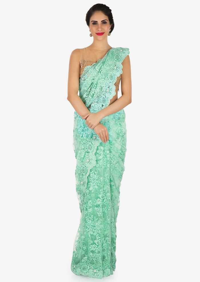 Sea blue saree in embroidered net with resham and cut dana embroidery only on Kalki