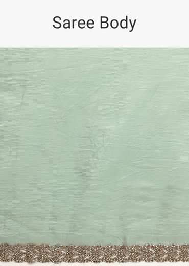 Sea Green Crushed Tissue Saree With Stone Embellished Border