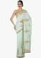 Sea green saree in silk adorn in zardosi and cut dana work only on Kalki