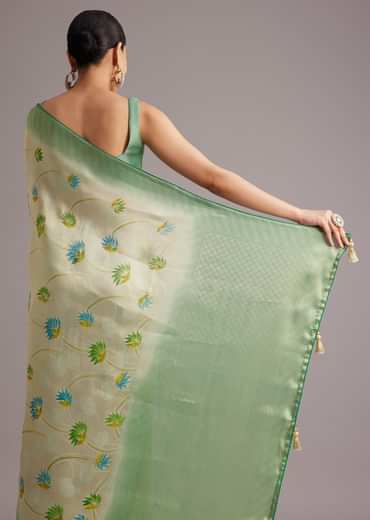 Sea Green Tissue Silk Floral Motif Saree With Contrast Pallu And Border
