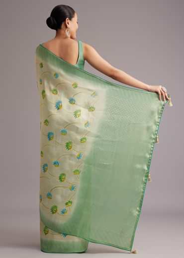 Sea Green Tissue Silk Floral Motif Saree With Contrast Pallu And Border