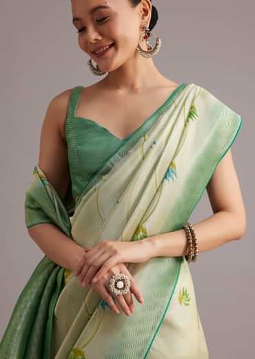 Sea Green Tissue Silk Floral Motif Saree With Contrast Pallu And Border