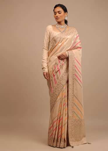 Cream Saree In Dola Silk With Multi Colored Woven Diagonal Stripes And Floral Border