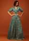 Turquoise Green Printed Blouse And Lehenga In V Neckline & Balloon Sleeves With Embellishment