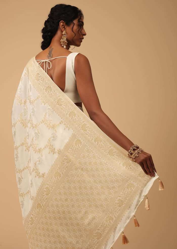 Ivory White Dola Silk Saree With Silver And Gold Jaal Embroidery In Floral Pattern