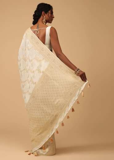 Ivory White Dola Silk Saree With Silver And Gold Jaal Embroidery In Floral Pattern