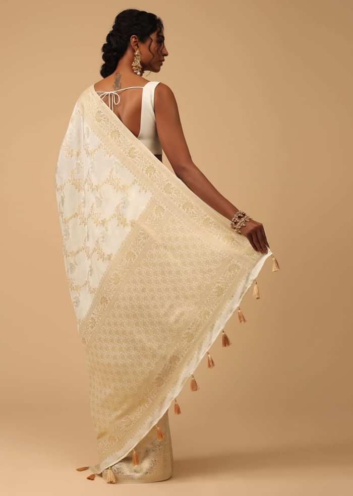 Ivory White Dola Silk Saree With Silver And Gold Jaal Embroidery In Floral Pattern