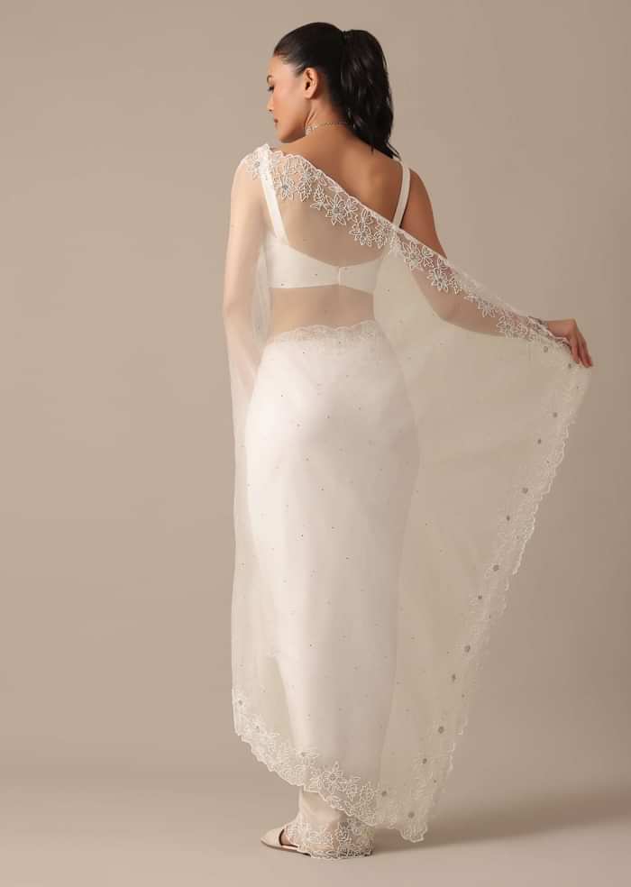 White Organza Saree With Cutdana Work And Unstitched Blouse Piece