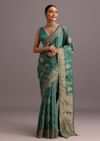 Teal Zari Work Satin Silk Woven Saree And Brocade Border