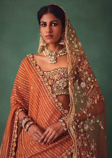 Rust Raw Silk Bridal Lehenga With Buti Work Dupatta