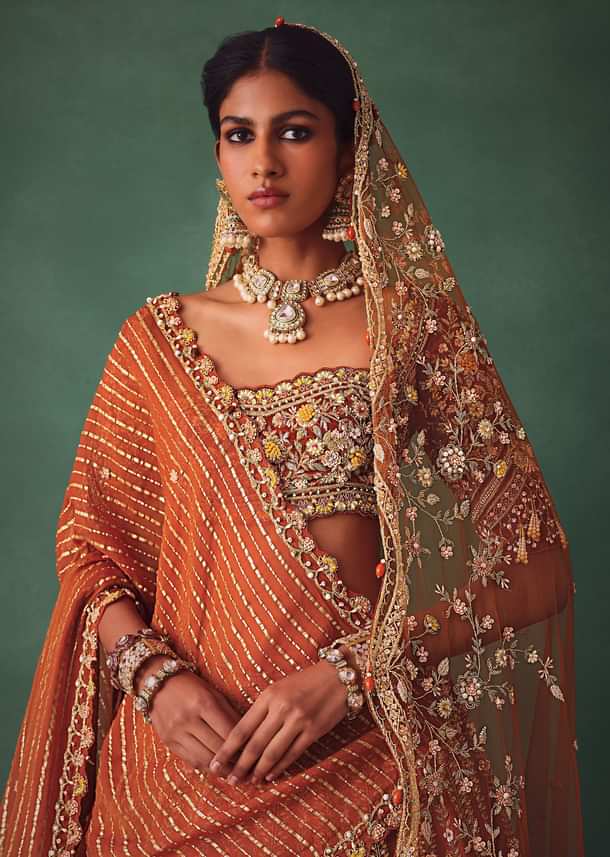 Rust Raw Silk Bridal Lehenga With Buti Work Dupatta