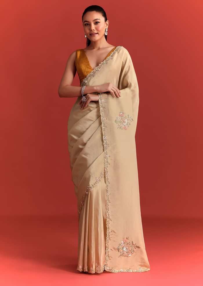 Off White Tissue Saree With Cutdana And Stone Work