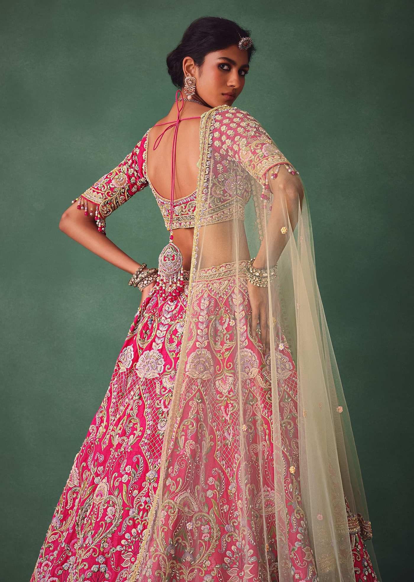 Rose Pink Bridal Lehenga With Scoop Neckline Blouse And Hand Work Dupatta
