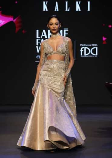 Gold Banarasi Embroidered Long Jacket With Sleeveless Blouse And Fishcut Lehenga