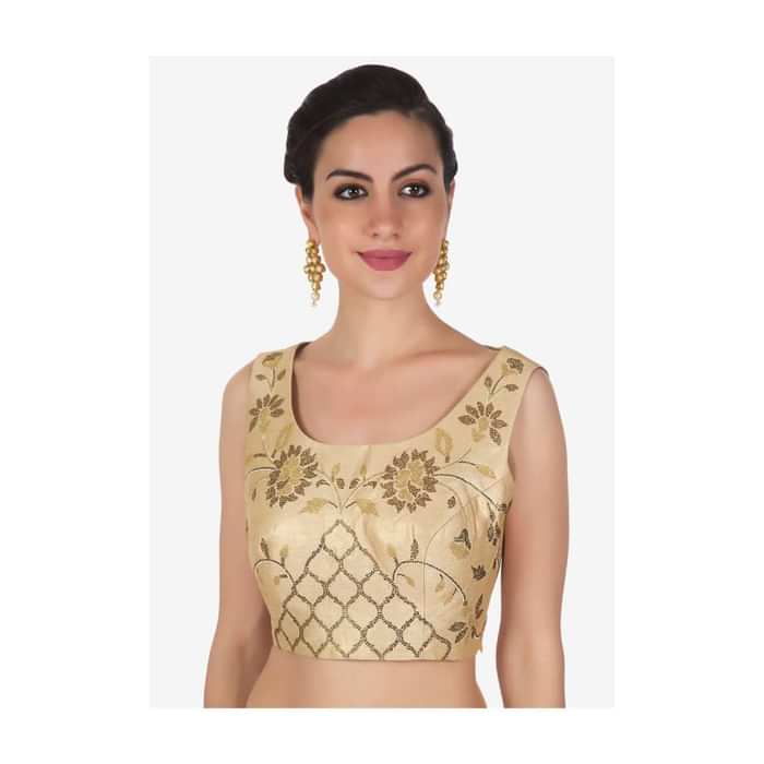 Shimmer blouse in light gold adorn in kundan embroidery only on Kalki