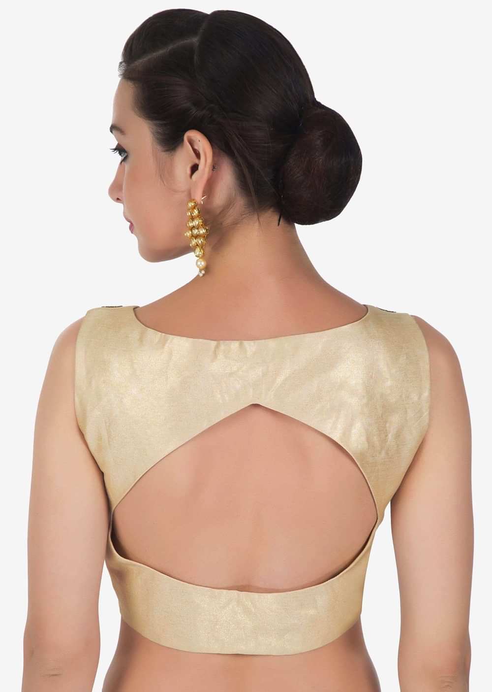 Shimmer blouse in light gold adorn in kundan embroidery only on Kalki