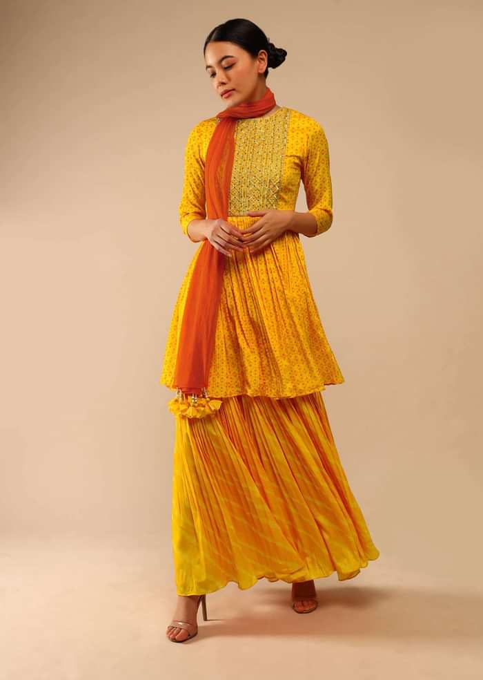 Honey Yellow Sharara Suit In Crepe With Bandhani And Lehariya Print Paired With Moti Embroidered Peplum Kurti
