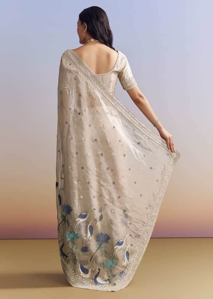 Silver Tissue Saree With Intricate Resham Motifs And Beaded Border Embroidery