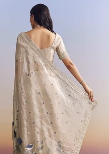Silver Tissue Saree With Intricate Resham Motifs And Beaded Border Embroidery