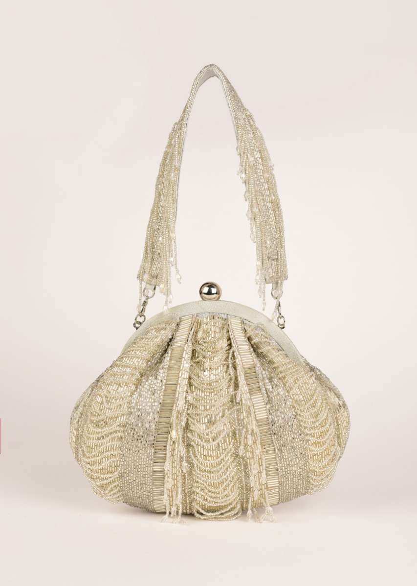 Silver Clutch Heavily Embroidered With Cut Dana And Beads Embroidered Stripes Along With Tassel Detailing Online - Kalki Fashion