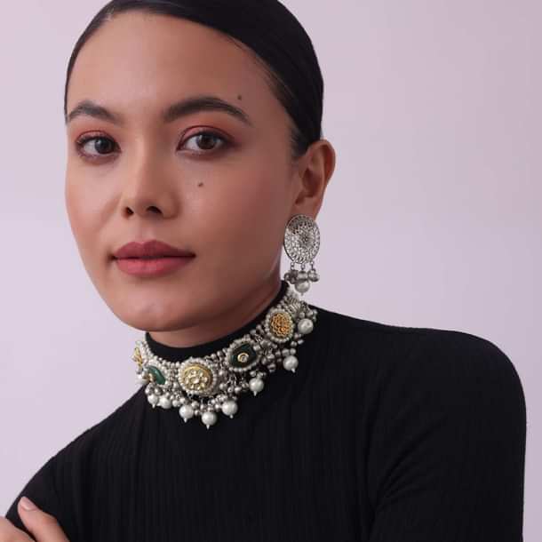 Silver Finish Choker And Earring Set Infused With Kundan Work And Pearls Silver Finish Choker And Earring Set Infused With Kundan Work And Pearls