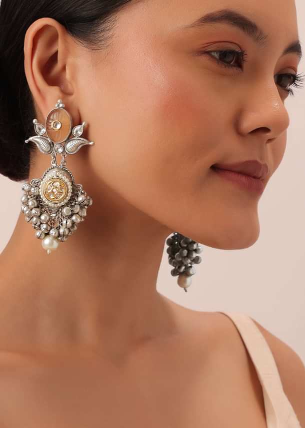 Silver Finish Orange Oxidsed Danglers With Meenakari And Carved Detail Silver Finish Orange Oxidsed Danglers With Meenakari And Carved Detail
