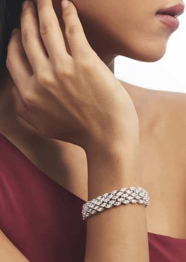 Silver Zircon Bangle With Intricate Detailing