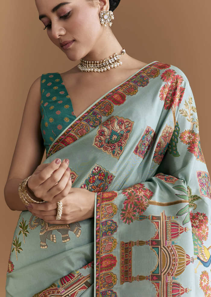 Sky Blue Dola Silk Saree With Madhubani Weave And Embroidery
