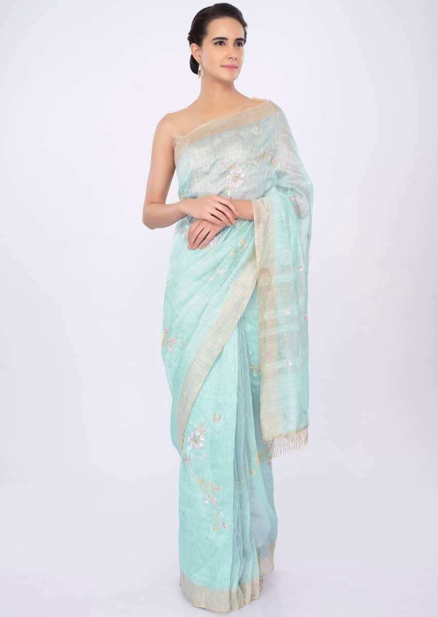 Sky blue linen saree in floral jaal embroidery only on kalki