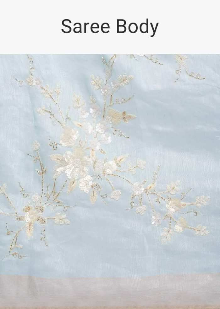 Sky blue linen saree in sequins and cut dana embroidery only on Kalki