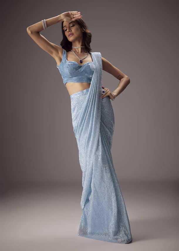 Sky Blue Shimmer Saree Paired With A Sweetheart Velvet Blouse