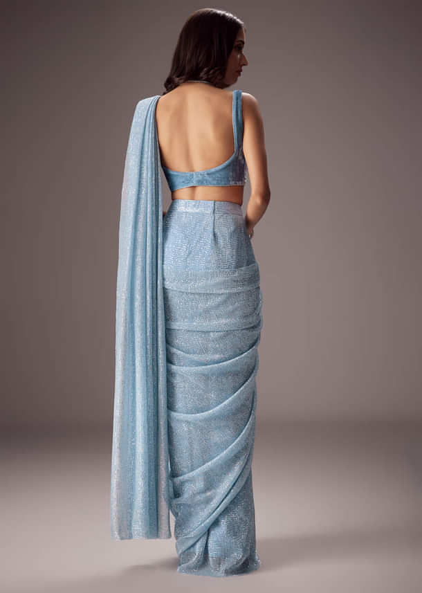 Sky Blue Shimmer Saree Paired With A Sweetheart Velvet Blouse