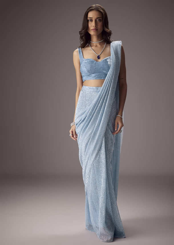 Sky Blue Shimmer Saree Paired With A Sweetheart Velvet Blouse