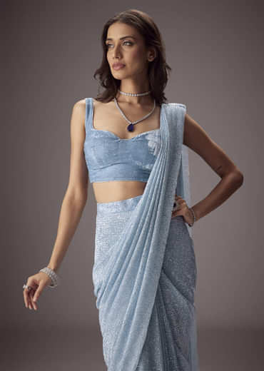 Sky Blue Shimmer Saree Paired With A Sweetheart Velvet Blouse