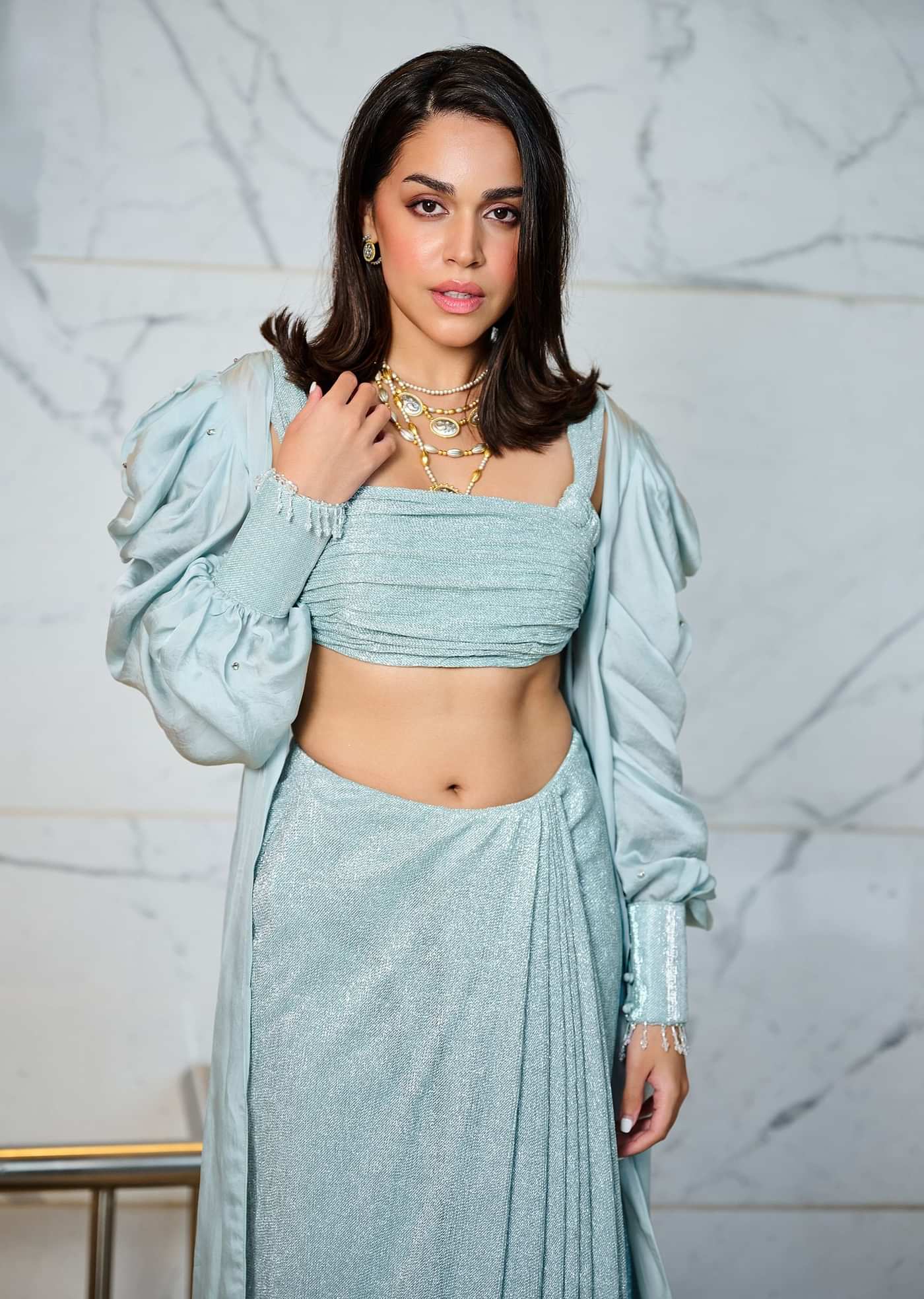 Sky Blue Back Open Blouse With Draped Skirt And Puff Jacket