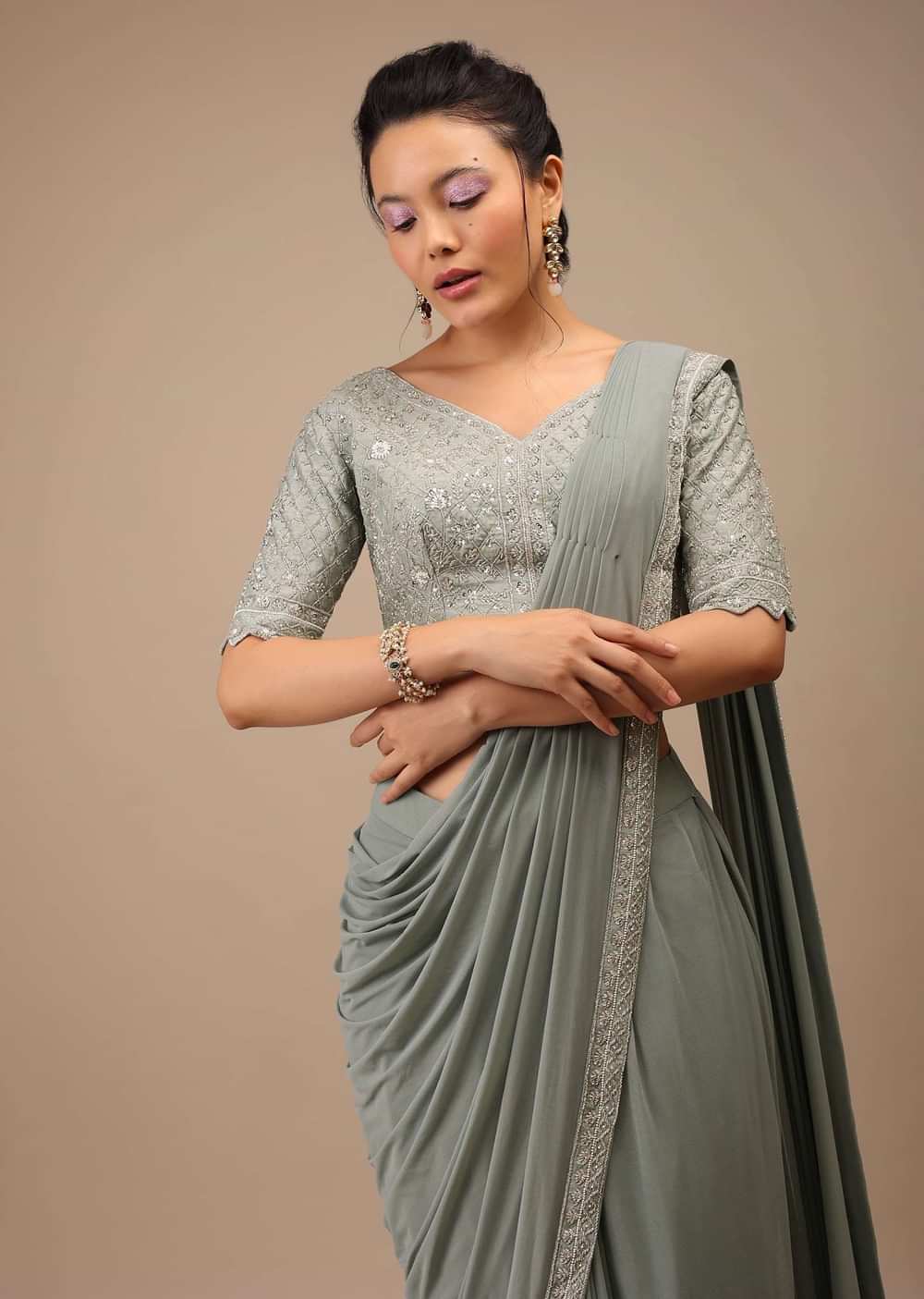 Slate Grey Lycra Blend Saree Finished In A Moroccan Jaal With Sequins Work And Cut Dana Floral Detailing